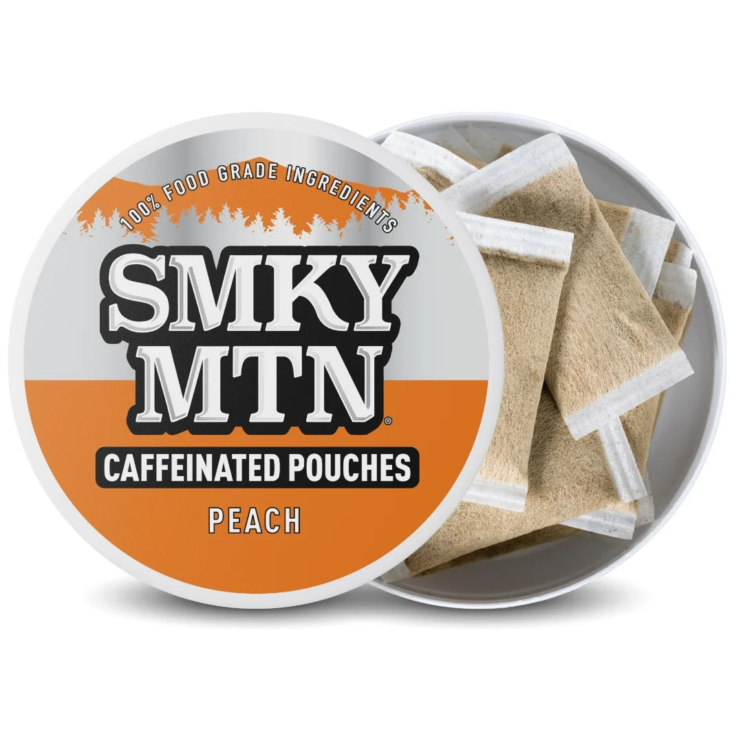 Caféinated pouches by Smky MTN with peach flavor in a container.